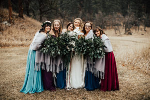 bridal party posing in the south dakota black hills stratobowl